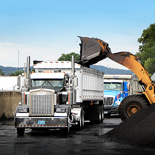 Moving coal to a truck at Wellsville Terminals